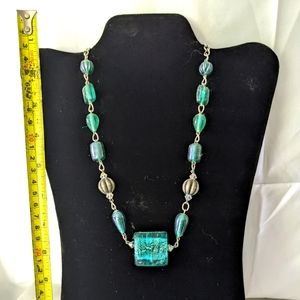 Turquoise glass with silver bead accents necklace.